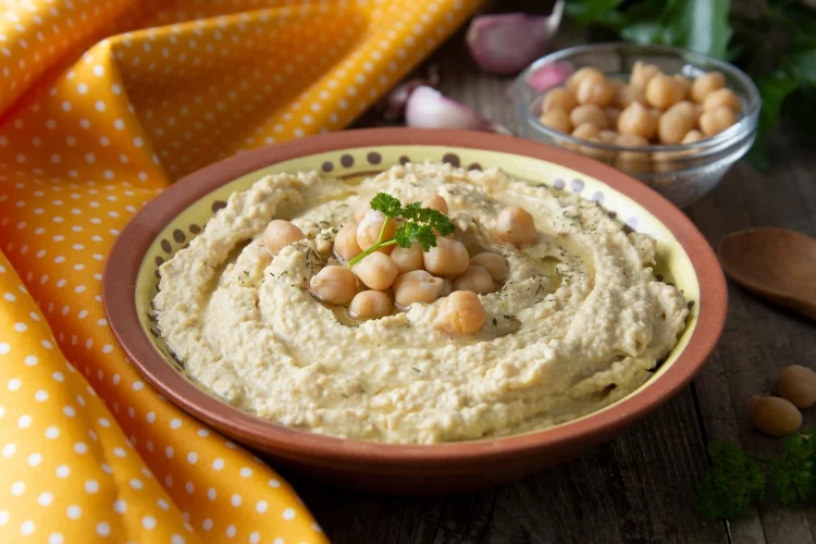 Hummus: A classic dip made with chickpeas, olive oil, and lemon juice that can also be used as a spread